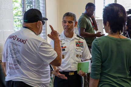 Joint Task Force-Red Hill (JTF-RH) Strategic Engagement Director, U.S. Army Brig. Gen. Lance Okamura, engages with local residents during JTF-RH’s Defueling Open House on Ke’ehi Lagoon Memorial in Honolulu, Hawaii, May 23, 2023.