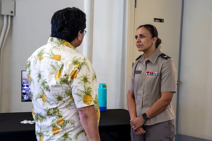 Joint Task Force-Red Hill (JTF-RH) Safety and Quality Assurance Director, U.S. Army Col. Letsy Perez-Marsden, listens to a local resident during JTF-RH’s Defueling Open House on Ke’ehi Lagoon Memorial in Honolulu, Hawaii, May 24, 2023.