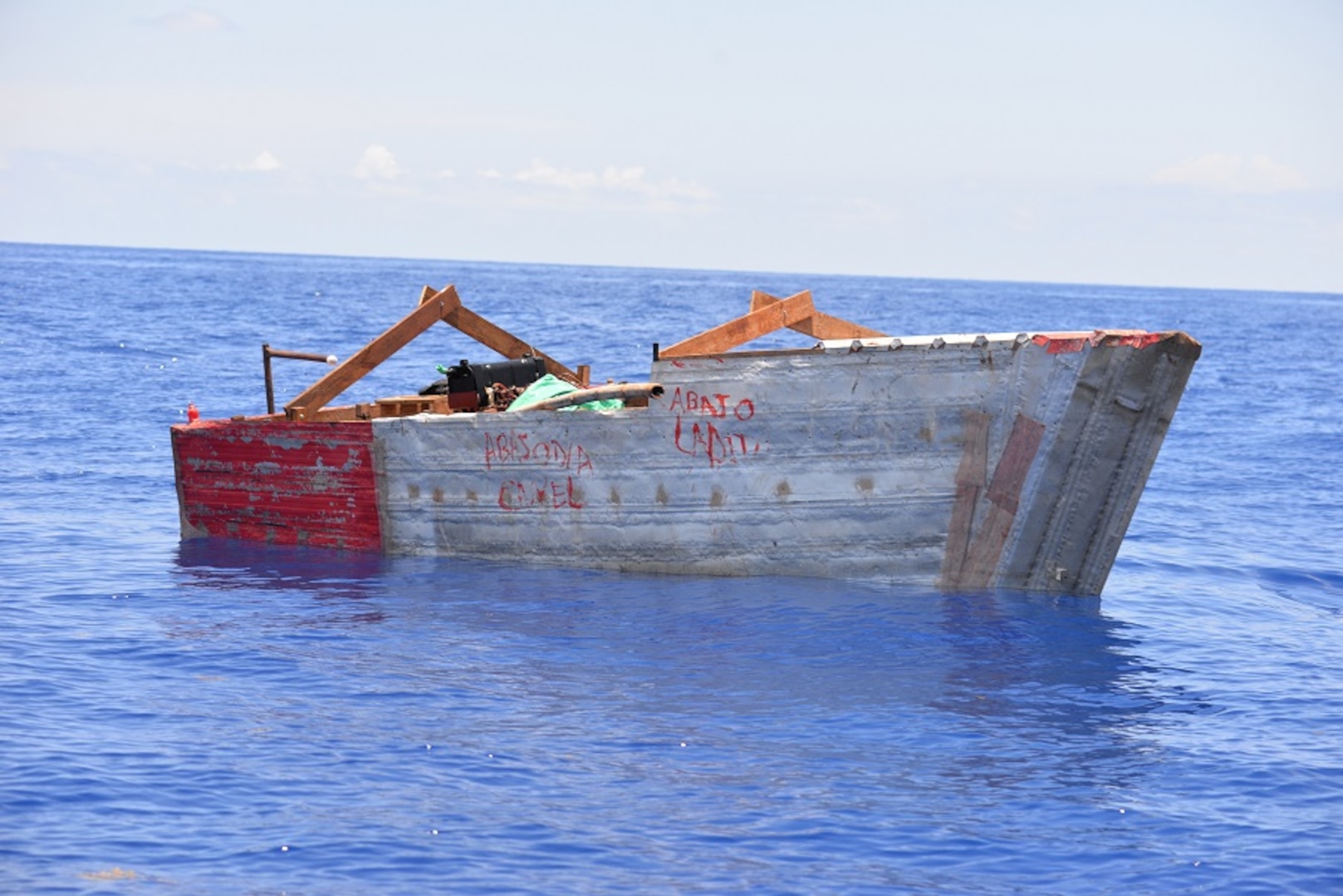 A migrant chug sits in the Caribbean Sea about 50 miles southwest of Key West, Florida, May 19, 2023. The Coast Guard interdicted 12 people from the chug. (U.S. Coast Guard photo).