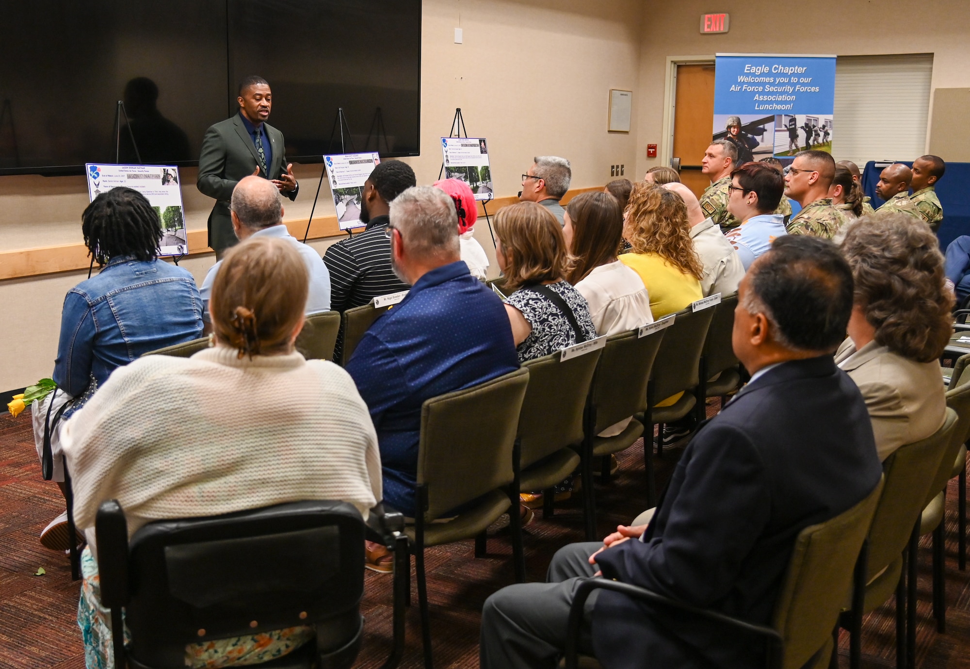 Timothy Gerald, center, a member of the Senior Executive Service, is the Deputy Director of Security Forces, Deputy Chief of Staff for Logistics, Engineering and Force Protection, Headquarters U.S. Air Force, speaks to families of fallen defenders at a family appreciation event hosted by the Air Force Security Forces Association Eagle Chapter at the Pentagon, Va., May 12, 2023. The security forces Airmen’s names were dedicated on the National Law Enforcement Memorial in Washington, D.C. (U.S. Air Force photo by Abigail Meyer)