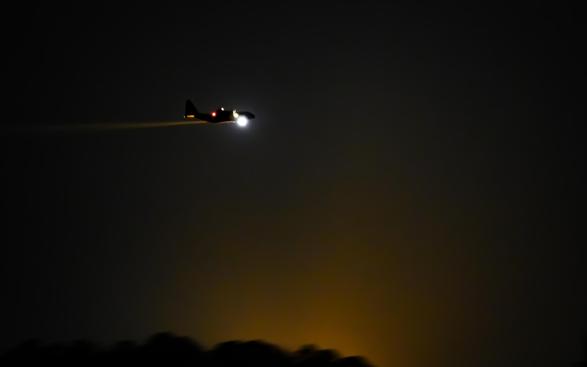 An aerial spray-modified C-130H Hercules aircraft assigned to the 910th Airlift Wing, Youngstown Air Reserve Station, Ohio, operates over Joint Base Charleston, South Carolina, May 16, 2023.