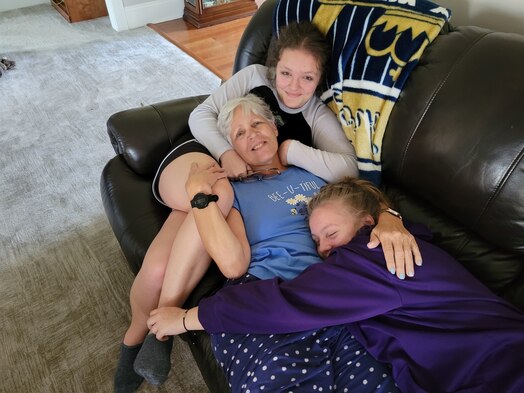  Driver Elizabeth Gray Edwards' mother, Mary Lou Woolard (middle) smiles alongside grandchildren—14-year-old Savannah Edwards and 12-year-old Lilly Edwards. Woolard is beyond thankful for the heroic act of U.S. Air Force Tech Sgt. William Gonzalez and saving her daughter's life. (Courtesy photo)