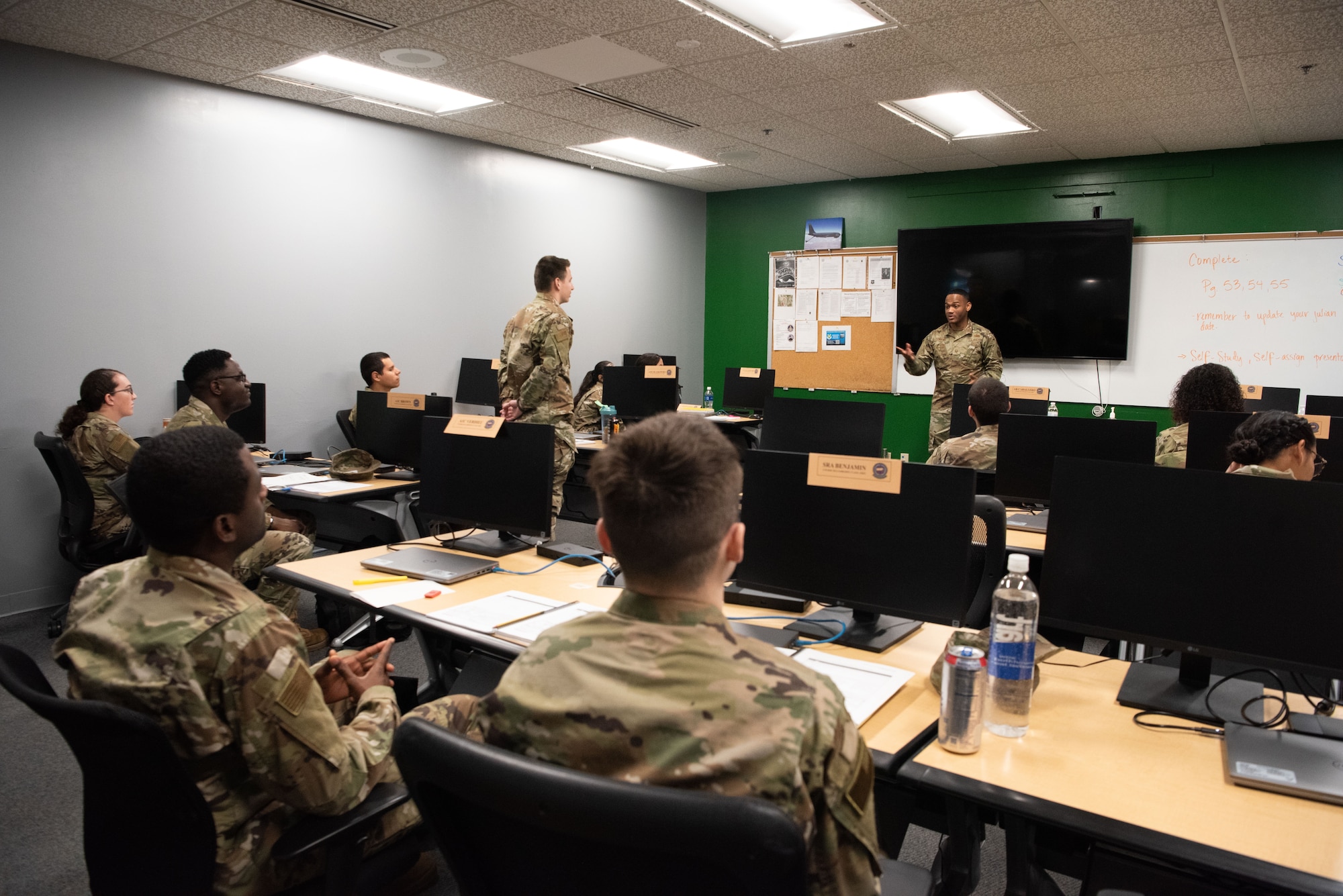 Master Sgt. Marvin Hawkins, 437th Supply Chain Operations Squadron, motions as he speaks to a technical training student at the 344th Training Squadron at JBSA-Lackland, May 9, 2023. Approximately 100 Airmen attended the briefing as career field managers discussed a variety of jobs in their specialty across the Air Force and helped them learn about future potential opportunities. (U.S. Air Force photo by Vanessa R. Adame)