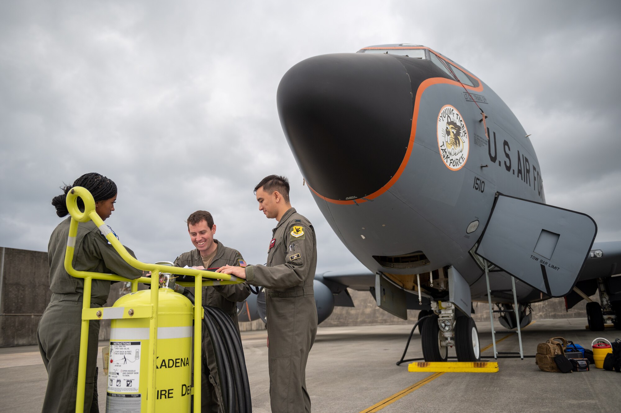 Airmen review jet maintenance records