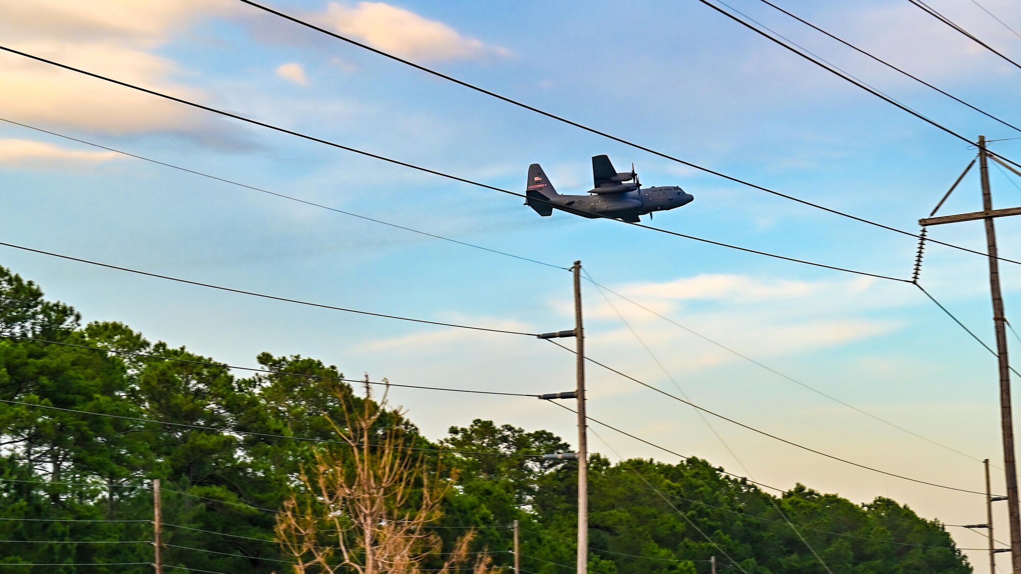 An aerial spray-modified C-130H Hercules aircraft assigned to the 910th Airlift Wing, Youngstown Air Reserve Station, Ohio, operates over Joint Base Charleston, South Carolina, May 16, 2023.