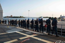 230525-N-LK647-1614 GOTHENBURG (May 25, 2023) Sailors assigned to the Ticonderoga-class guided missile cruiser USS Normandy (CG 60) man the rails as the ship pulls into Gothenburg, Sweden, May 25, 2023. Normandy is part of the Gerald R. Ford Carrier Strike Group and is on a scheduled deployment in the U.S. Naval Forces Europe area of operations, employed by Sixth Fleet to defend U.S., allied, and partner interests. (U.S. Navy photo by Mass Communication Specialist 2nd Class Malachi Lakey)