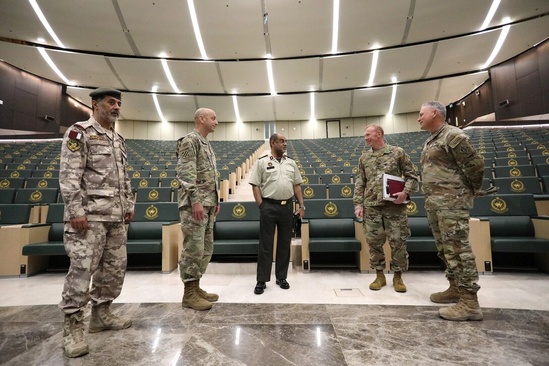 BG Hamed Mohammed M A Alyafei, the Director of Administration Human Resources of the Air Defense Operations Center (ADOC) for the Qatar Emiri Air Defense Forces (QEADF) and  COL Al-Khayarin, Commander of the Air Defense Operations Center (ADOC) meet with Lt. Gen. Scott Spellmon, 55th Chief of Engineers, to give him a tour of the SHIELD 5 missile defense headquarters in Qatar. The headquarters was built by the U.S. Army Corps of Engineers Transatlantic Middle East District as part of a foreign military sales case to build infrastructure for the Qataris Patriot Missile Defense systems.