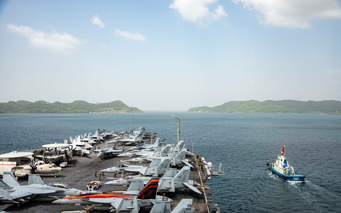 USS Nimitz (CVN 68) departs Sasebo, Japan, after completing a routine port visit.