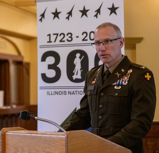 Col. Michael Eastridge, former commander of the 33rd Infantry Brigade Combat Team, addresses the crowd during a ceremony commemorating the Battle of Hamel, a World War I battle which marked the first time U.S. forces fought alongside the Australian military, and marking the 300th birthday of the Illinois National Guard in Springfield May 6.