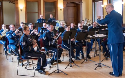 The Air National Guard Band of the Midwest, based at the 182nd Airlift Wing in Peoria, Illinois, and under the direction of Illinois Air National Guard Lt. Col. Bryan Miller, performs a musical selection during a concert celebrating the Illinois National Guard’s 300th birthday as part of day-long events in Springfield, May 6.