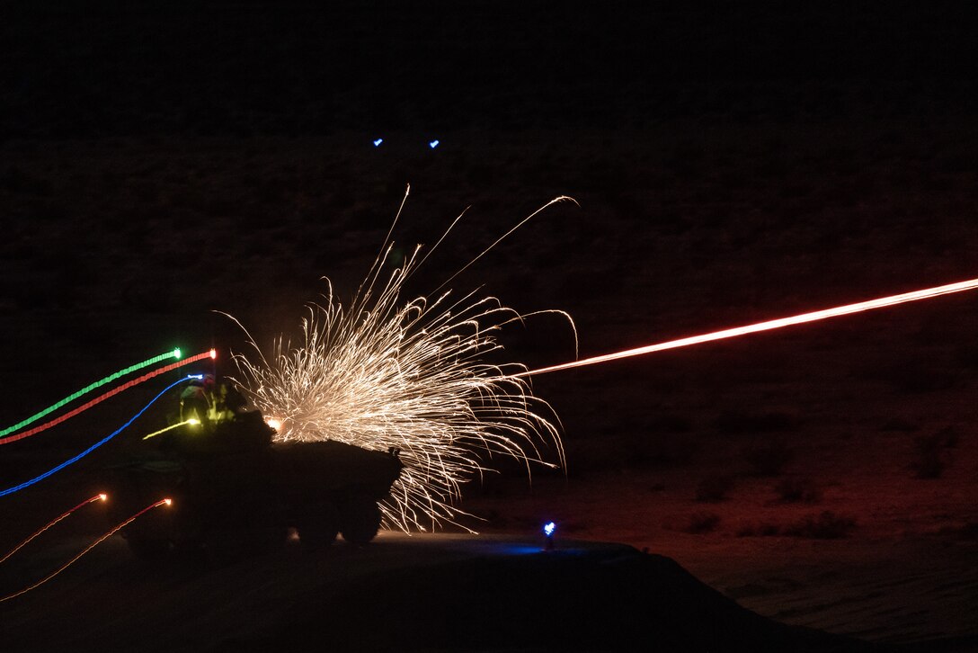 U.S. Marine Corps Light armored vehicles (LAV) assigned to 3rd and 1st Light Armored Reconnaissance Battalion, 1st Marine Division, are staged at night during the Bushmaster Challenge
