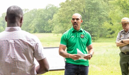 Officer Candidate LaQuan Melvin, of Joliet, talks about principles of war during the Illinois Army National Guard Officer Candidate School staff ride to the Shiloh National Military Park near Pittsburg Landing, Tennessee, May 20. Melvin presented his report at Fraley’s Field.