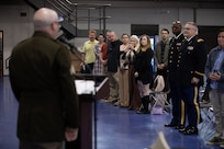 Newly-promoted Sgt. Maxwell Ehrlich, presents a speech following him getting pinned as sergeant May 6, 2023 at North Riverside Armory, Chicago Illinois. As Ehrlich’s family and friends stand during the ceremony he thanks everyone who joined him during a special moment in his military career.
