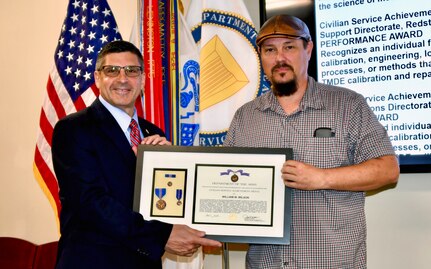 Civilian receives an award.