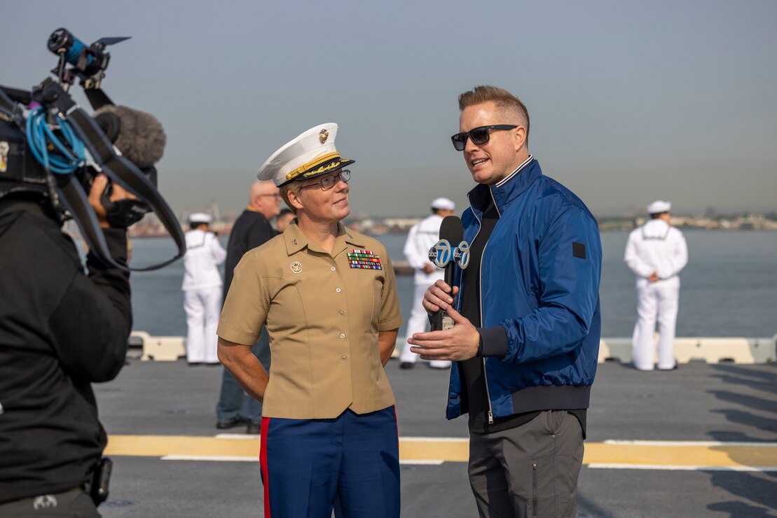 U.S. Marine Corps Col. Karin Fitzgerald, the commanding officer of Special Purpose Marine Air-Ground Task Force – New York, conducts an interview with ABC News during the Parade of Ships as part of Fleet Week New York 2023 (FWNY 23) onboard the Wasp-Class Amphibious Assault Ship USS WASP (LHD-1), May 24, 2023. During FWNY 23 more than 3,000 service members from the Marine Corps, Navy and Coast Guard and our NATO allies from Great Britain, Italy and Canada are engaging in special events throughout New York City and the surrounding Tri-State Region, showcasing the latest capabilities of today’s maritime services and connecting with citizens. FWNY events include free public ship tours, military static displays, and live band performances and parades. (U.S. Marine Corps photo by Lance Cpl. Jessica J. Mazzamuto)