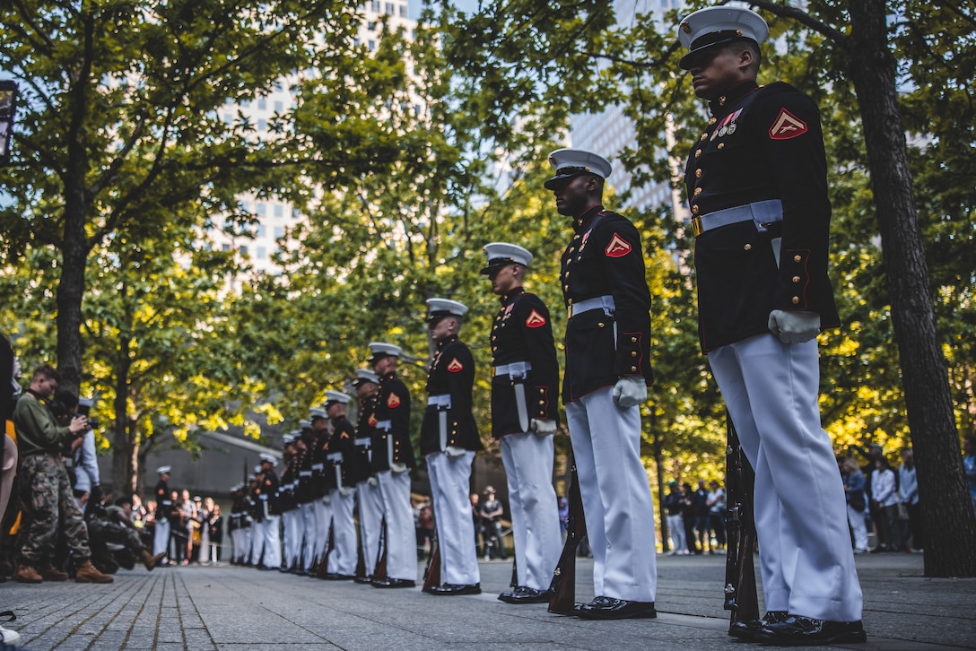 The U.S. Marine Corps Silent Drill Platoon performs at the 9/11 Memorial during Fleet Week New York (FWNY), May 25, 2023. FWNY 2023 provides an opportunity for the American public to meet Marines, Sailors, and Coast Guardsmen and see first-hand the latest capabilities of today’s maritime services. (U.S. Marine Corps photo by Cpl Meshaq Hylton)