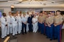 Marines, Sailors and Coast Guardsmen pose for a group photo with National Football League (NFL) Commissioner Roger Godell, center, during a tour at the NFL Headquarters as part of Fleet Week New York (FWNY), May 25, 2023. During FWNY 2023, more than 3,000 service members from the Marine Corps, Navy and Coast Guard and our NATO allies from Great Britain, Italy and Canada are engaging in special events throughout New York City and the surrounding Tri-State Region, showcasing the latest capabilities of today’s maritime services and connecting with citizens. These events include free public ship tours, military static displays, and live band performances and parades. (Photo by Mass Communication Specialist 1st Class Pedro A. Rodriguez)