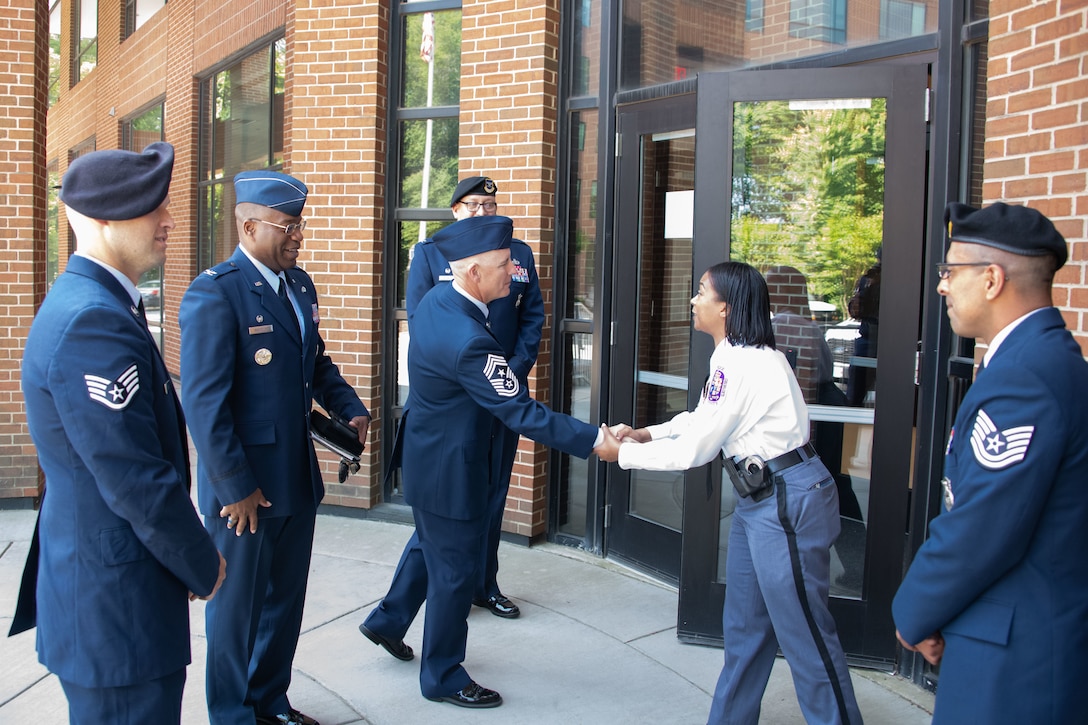 U.S. Airmen with the 316th Wing at Joint Base Andrews, Md., meet with police officers at the Prince George's County Police Department Headquarters in Upper Marlboro, Md., May 25, 2023. The PGPD held a Military Appreciation Month event to honor the Airmen and recognize their partnership. (U.S. Air Force photo by Senior Airman Daekwon Stith)