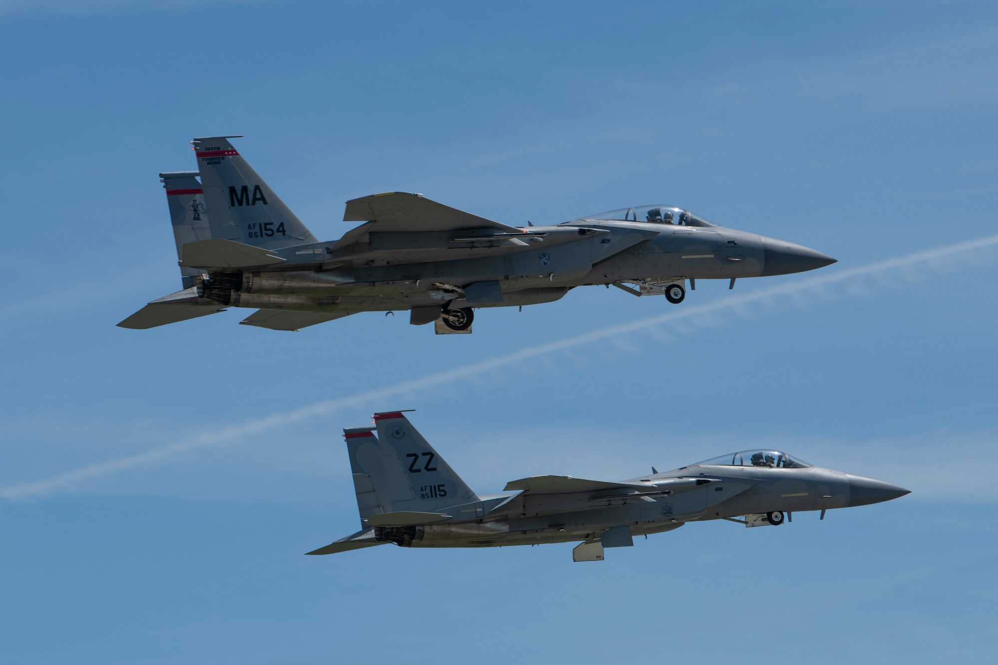 Two U.S. Air Force F-15C Eagles, with the 104th Fighter Wing, Massachusetts Air National Guard, perform a fly-by pass aerial demonstration during the 2023 Westfield International Air Show at Barnes Air National Guard Base, Massachusetts, May 13, 2023. The two-day event allowed the 104th Fighter Wing and joint-service partners to strengthen their community ties with over 70,000 members of the public by showcasing their capabilities, aircraft and equipment. (U.S. Air National Guard photo by Staff Sgt. Hanna Smith)