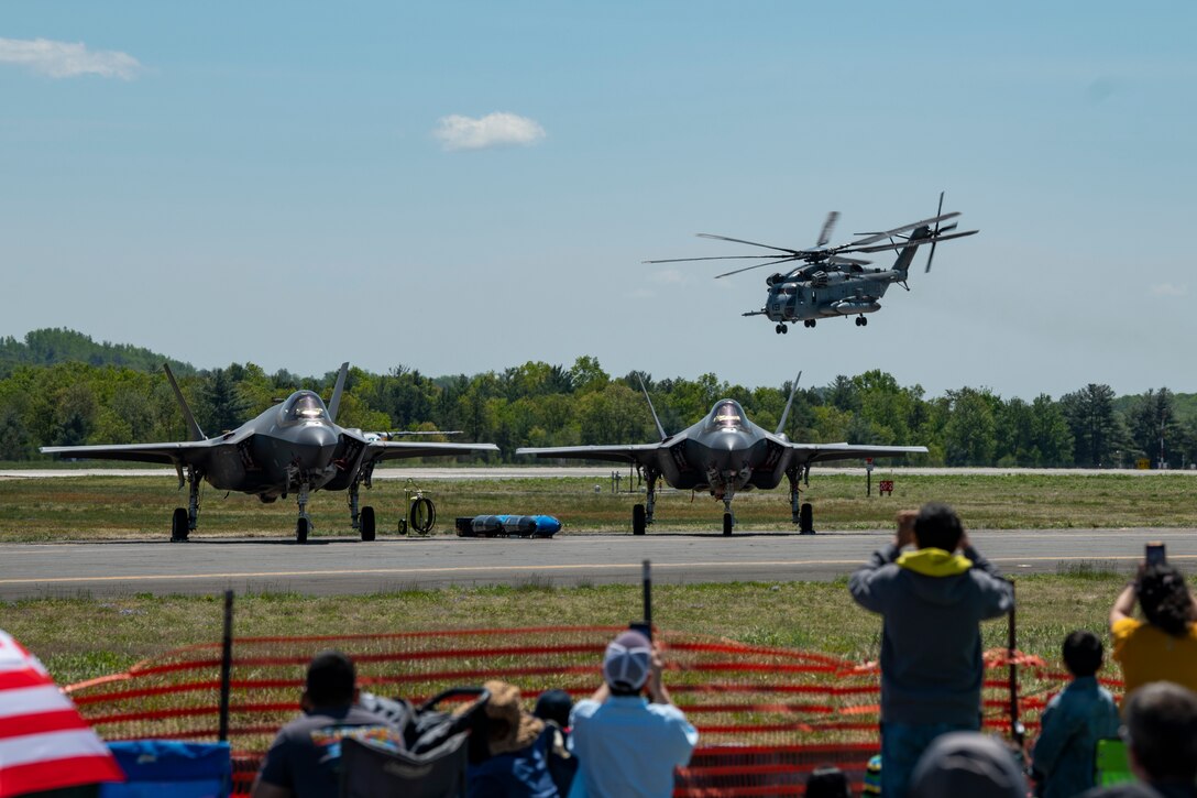 A U.S. Marine Corps CH-53E Super Stallion, with the Marine Heavy Helicopter Training Squadron 302, performs an aerial display during the 2023 Westfield International Air Show at Barnes Air National Guard Base, Massachusetts, May 14, 2023. The two-day event allowed the 104th Fighter Wing and joint-service partners to strengthen their community ties with over 70,000 members of the public by showcasing their capabilities, aircraft and equipment. (U.S. Air National Guard photo by Staff Sgt. Hanna Smith)