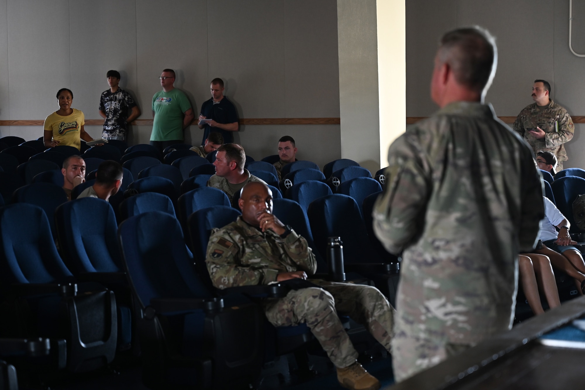 U.S. Air Force Brig. Gen. Paul Fast, 36th Wing commander, updates members of Team Andersen on current conditions during a town hall meeting about Super Typhoon Mawar at Andersen Air Force Base, Guam, May 29, 2023. Following the devastating effects of Super Typhoon Mawar, Fast addressed Team Andersen’s concerns about base services and functions. (U.S. Air Force photo by Senior Airman Kaitlyn Preston)