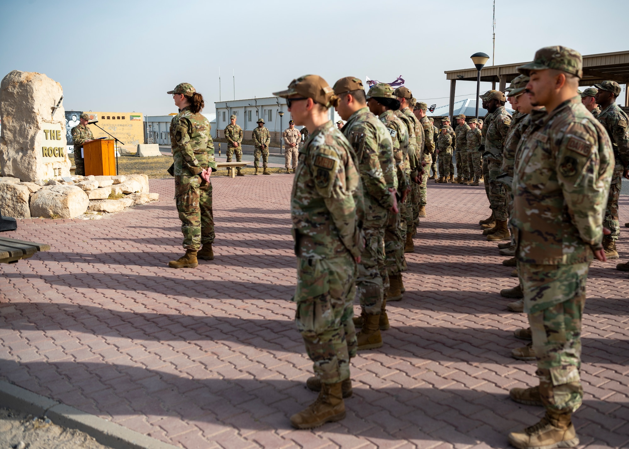 Service members pay tribute to fallen brothers and sisters in arms during a Memorial Day ceremony at Ali Al Salem Air Base.