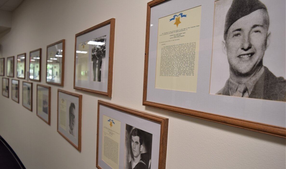 Remembering the legacy…staff assigned to Naval Hospital/Navy Medicine Readiness Training Unit Everett continue to honor their clinic’s namesake, Hospital Corpsman 2nd Class David R. Ray, for his selfless act while heroically caring for wounded Marines during action, March 19, 1969, during the Vietnam War, of which he was posthumously awarded the Medal of Honor (Official Navy photo by Douglas H Stutz, NHB/NMRTC Bremerton public affairs officer).
