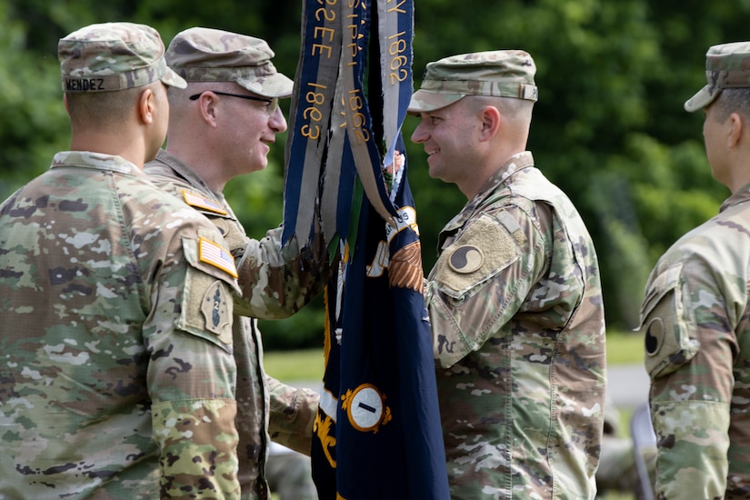 Lt. Col. Jason Partin, incoming commander of the 1st Battalion, 149th Infantry, Kentucky Army National Guard, receives the colors from Col. Jared Lake, 116th Infantry Brigade Combat Team, Virginia Army National Guard.