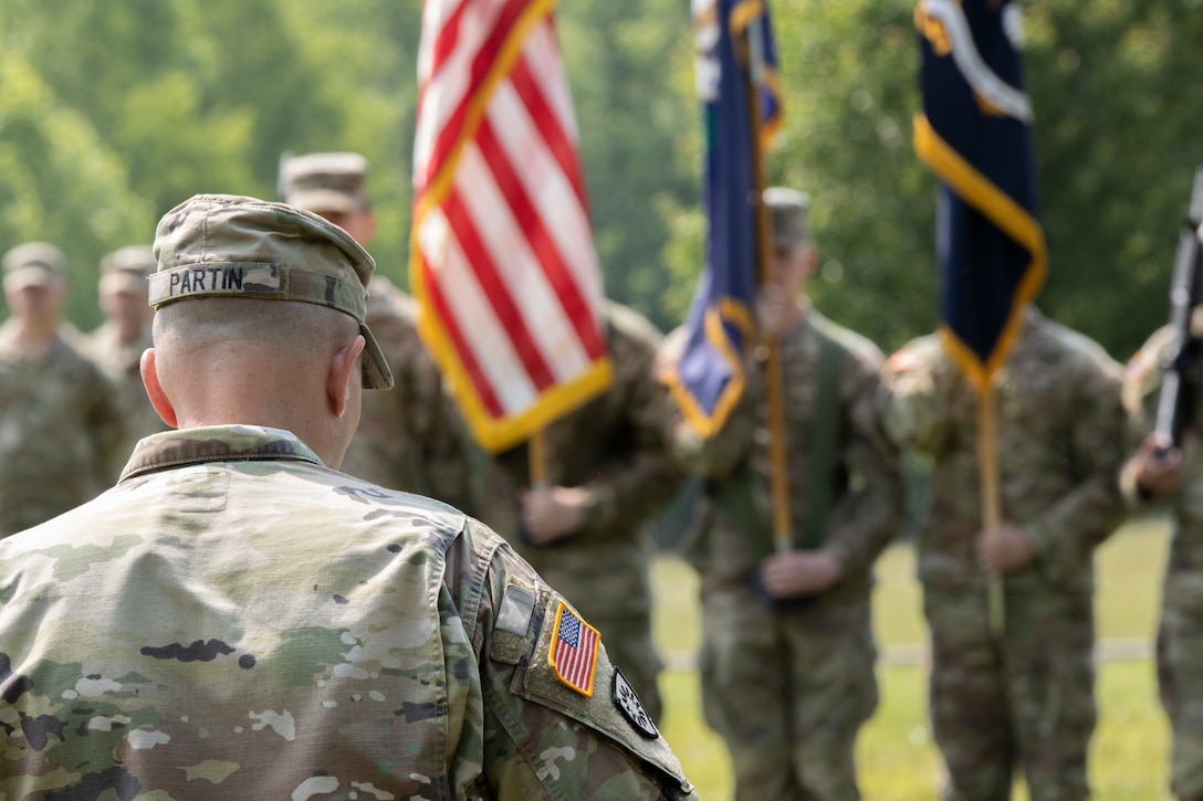 Lt. Col. Jason Partin, incoming commander of 1st Battalion, 149th Infantry, addresses his troops during a change of command ceremony.