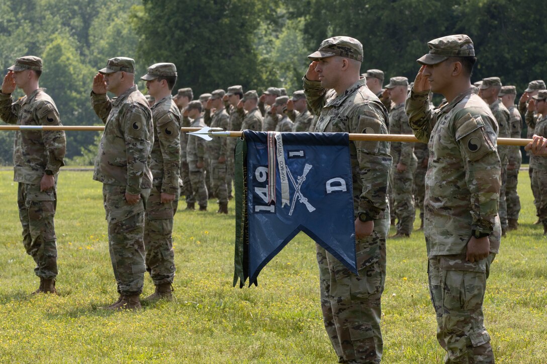 Members from 1st Battalion, 149th Infantry, Kentucky Army National Guard, salute during a battalion change of command ceremony held at Harold L. Disney Training Center in Artemus, Kentucky, May 21, 2023.