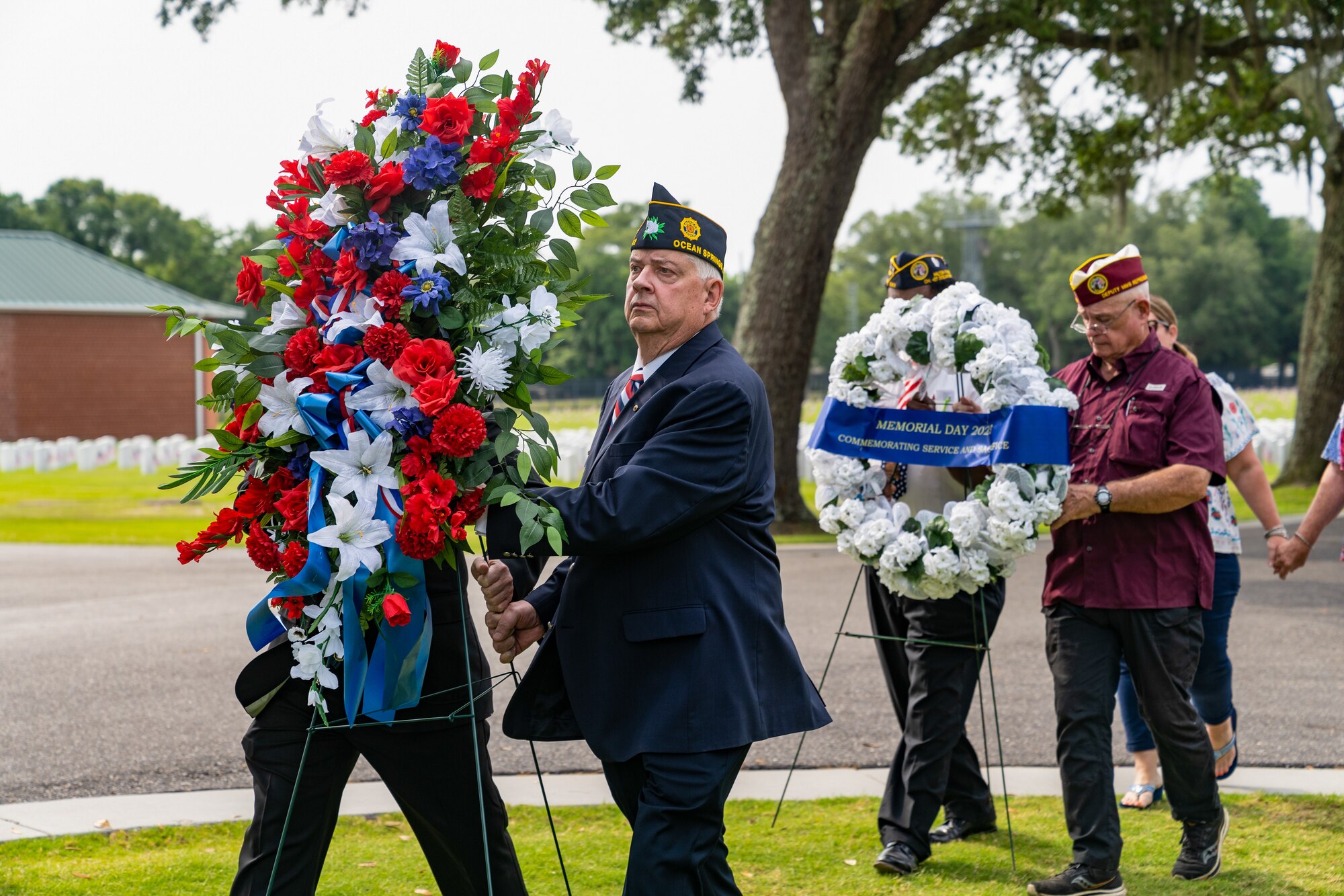 Members of the Veterans of Foreign Wars, Disabled Veterans, American Legion and Gold Star family members present the wreathes during the Memorial Day ceremony at the Biloxi National Cemetery, Mississippi, May 29, 2023.