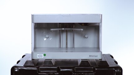 The Markforged MARK II 3D printer is displayed atop of the Tactical Fabrication Additive Manufacturing kit on Feb. 22. Carderock's Creative Media Branch is working alongside the Additive Manufacturing Branch to create a pack-out and set-up video, as well as a various how-to videos to be provided to the Marine Corps instructors. (U.S. Navy photo by Devin Pisner)