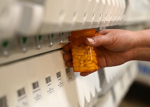 Jessica Carbajal, 355th Healthcare Operations Squadron pharmacy technician, fills a prescription in the Exchange Pharmacy at Davis-Monthan Air Force Base, Ariz., May 23, 2023. Carbajal fills prescriptions, conducts prescription intake and conducts medical inventory. (U.S. Air Force photo by Staff Sgt. Abbey Rieves)
