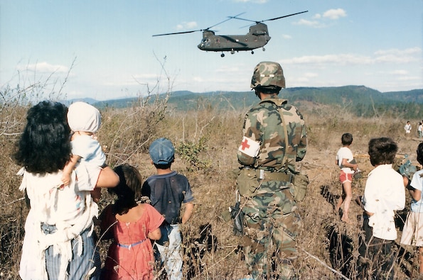 A CH-47 transport helicopter delivers medical supplies to U.S. forces during a training exercise near Tamara, Honduras, March 1988. (Source: Office of the Secretary of Defense, NARA)