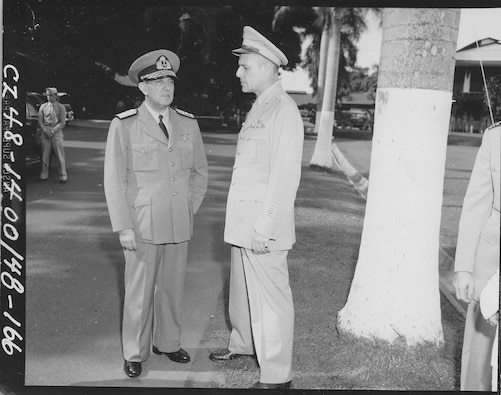 Lieutenant General Matthew Bunker Ridgway, Commander, U.S. Caribbean Command (1948-49), talks with Vice Admiral Juan M. Carranza, Chief of Naval Operations, Argentina, on his visit to Quarry Heights, July 1948.