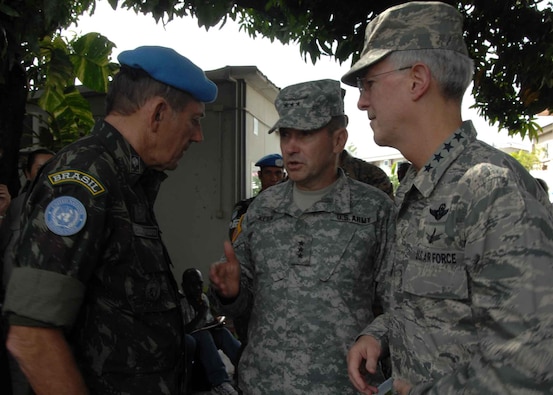 From right, U.S. Air Force Gen. Douglas Fraser, commander of U.S. Southern Command, and Army Lt. Gen. P.K. "Ken" Keen, commander of Joint Task Force Haiti, visit with Brazilian Cmdr. Carlos Chagas, of the United Nations Stabilization Mission in Haiti (MINUSTAH), in Port-au-Prince, Haiti, Jan. 19, 2010.