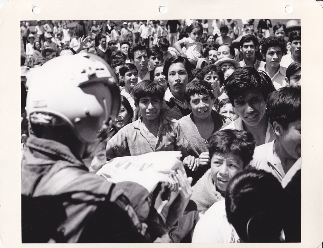 U.S. servicemembers unload food aid following severe flooding in Peru, June 1970. (Source: U.S. Air Force, NARA)
