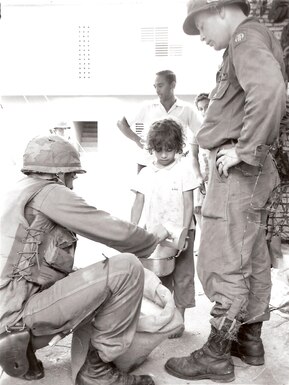 U.S. Soldiers provide aid in the Dominican Republic, 1965.