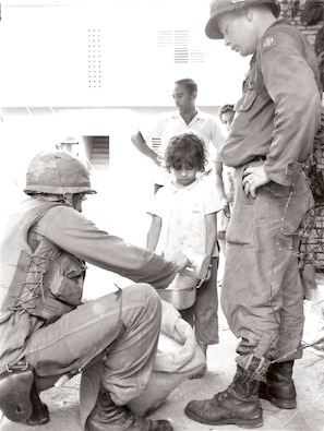 U.S. Soldiers provide aid in the Dominican Republic, 1965.