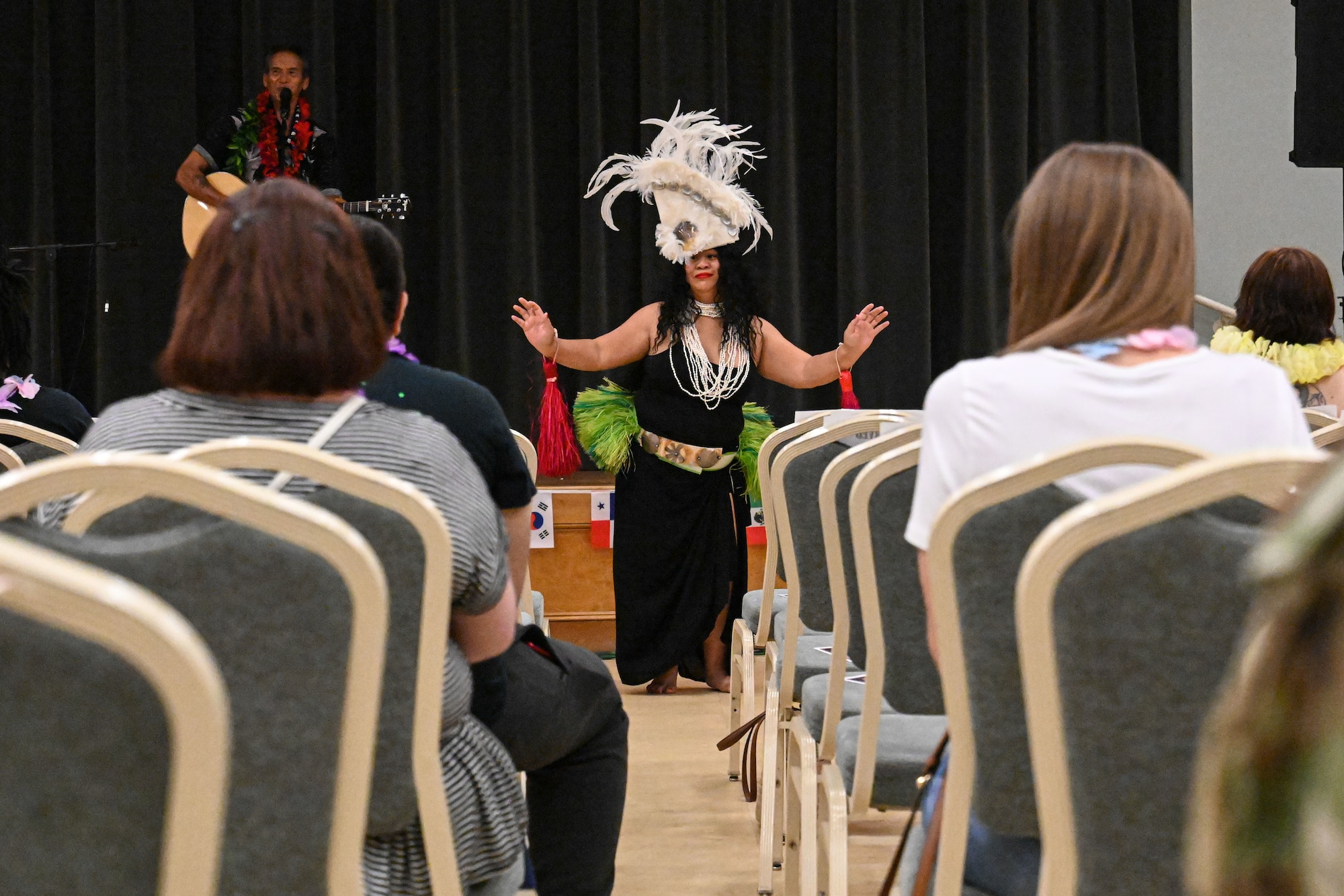 a performer dances on stage