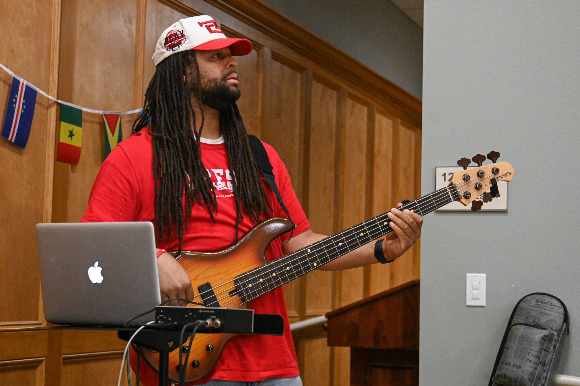 a man plays his guitar