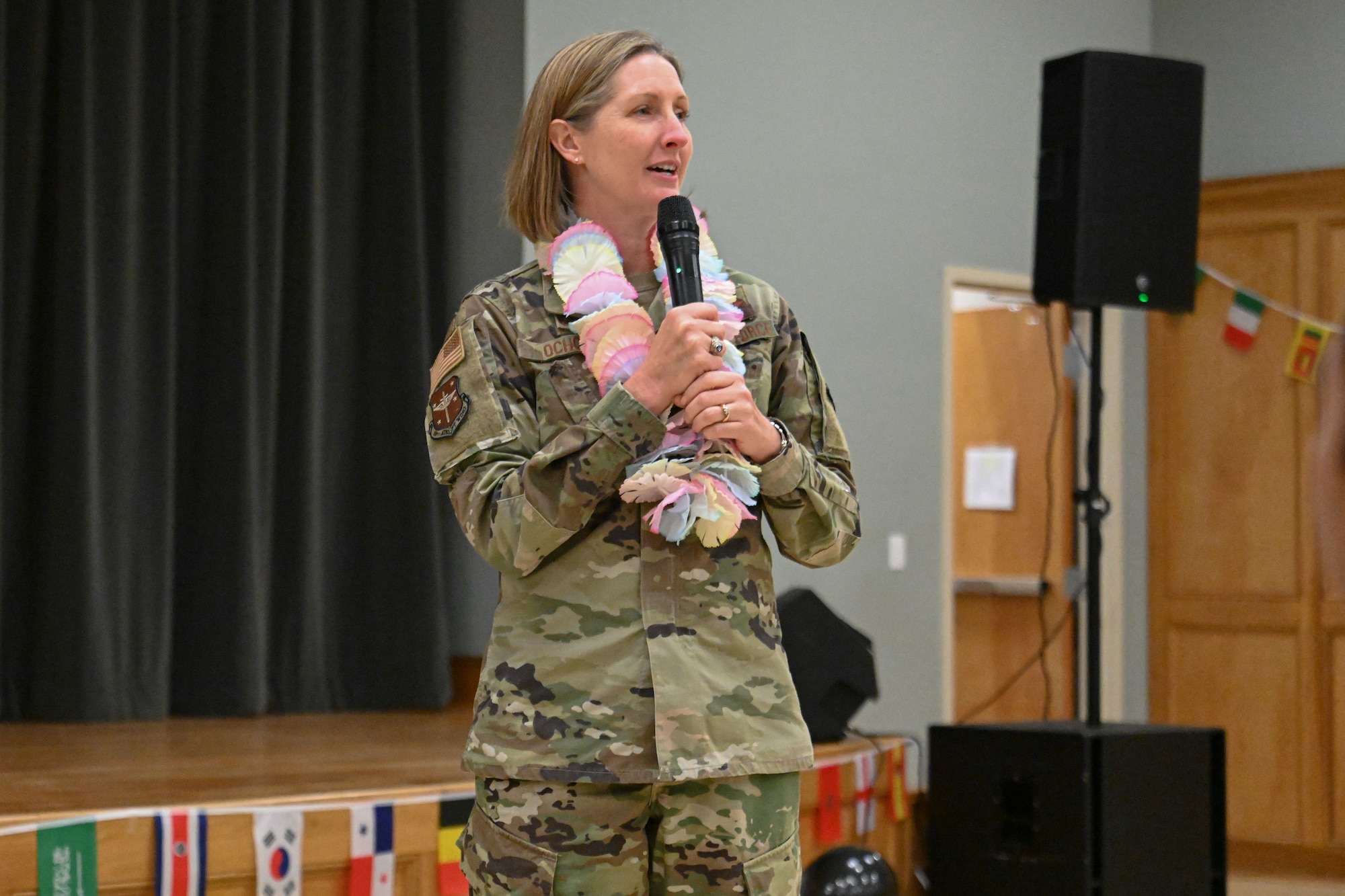 women in uniform gives a speech