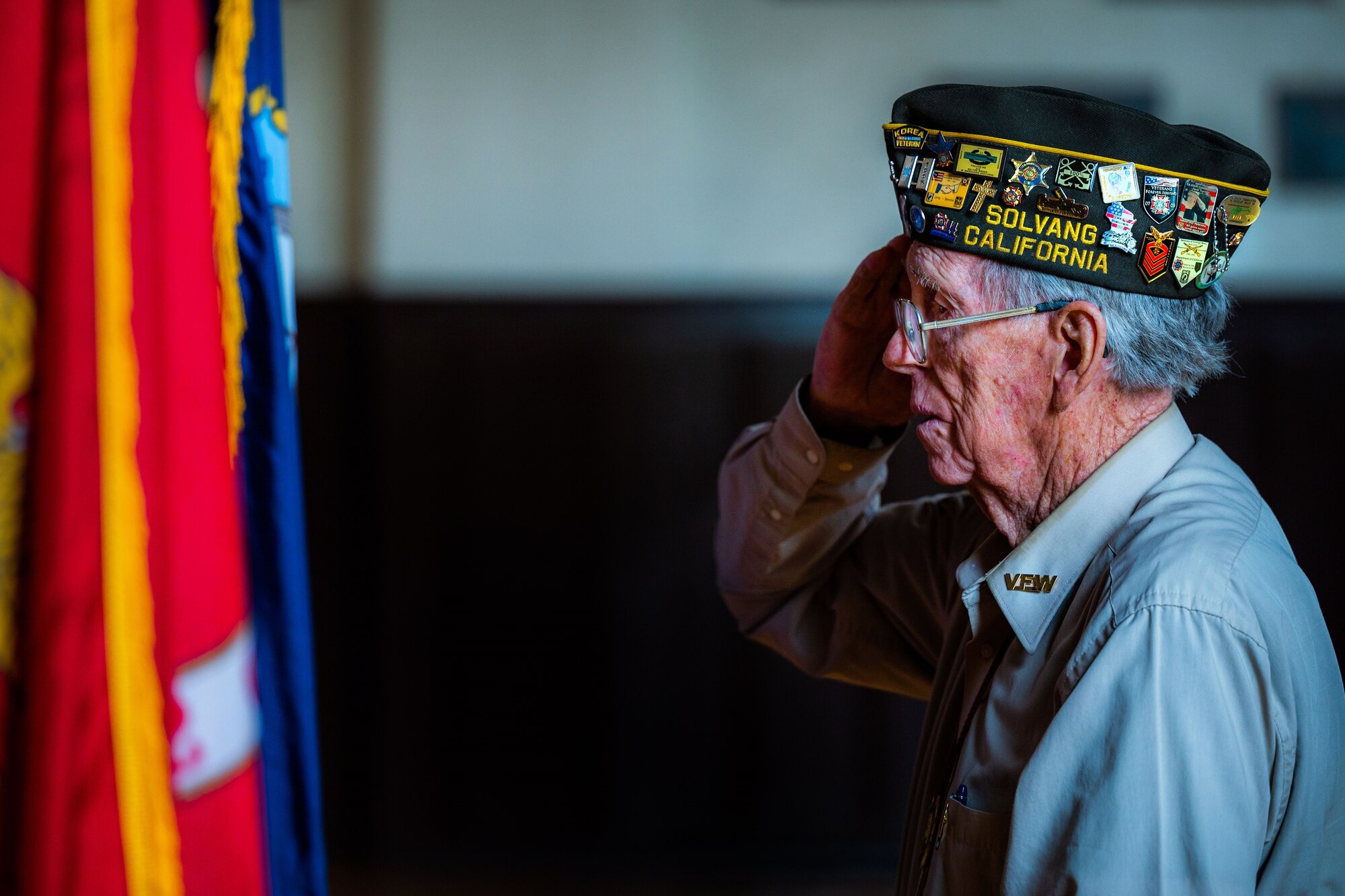 A Veteran from Solvang salutes the POW/MIA flag during a Memorial Day ceremony at the Solvang Veterans Memorial Hall in Solvang, Calif., May 29, 2023. U.S. Space Force Maj. Gen. Douglas A. Schiess, Combined Force Space Component Command commander, gave the keynote speech to over 200 attendees that included veterans from the Global War on Terrorism, Vietnam, Korea and even one veteran from WWII. The ceremony also included the raising on the American Flag by a local Cub Scouts group and a laying of a wreath with a Gold Star family member. (U.S. Space Force photo by Tech. Sgt. Luke Kitterman)