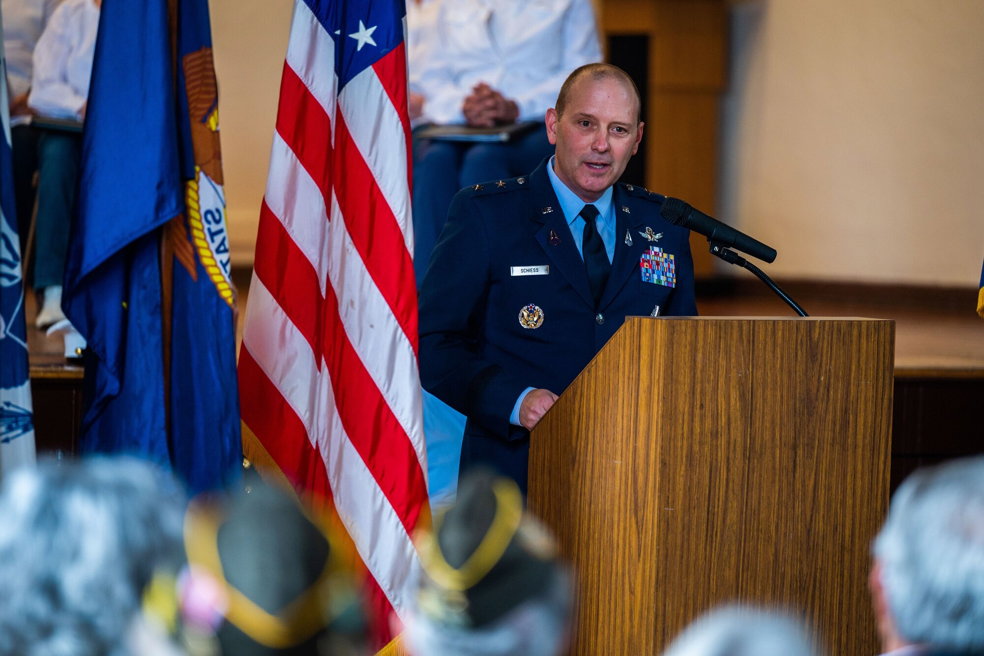 U.S. Space Force Maj. Gen. Douglas A. Schiess, Combined Force Space Component Command commander, gives his keynote speech during a Memorial Day ceremony at the Solvang Veterans Memorial Hall in Solvang, Calif., May 29, 2023. General Schiess gave the keynote speech to over 200 attendees that included veterans from the Global War on Terrorism, Vietnam, Korea and even one veteran from WWII. The ceremony also included the raising on the American Flag by a local Cub Scouts group and a laying of a wreath with a Gold Star family member. (U.S. Space Force photo by Tech. Sgt. Luke Kitterman)