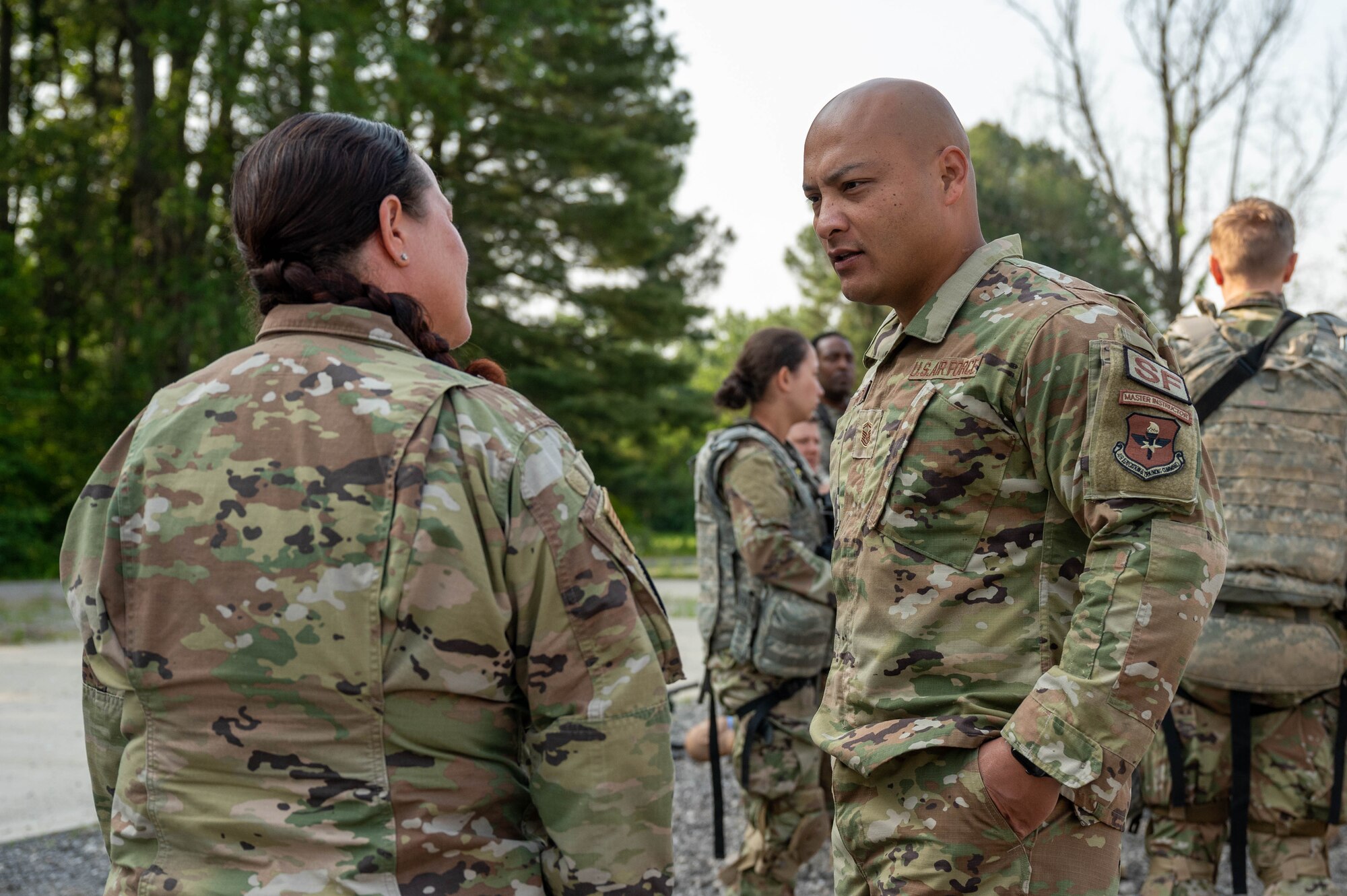 Airmen talk to each other.