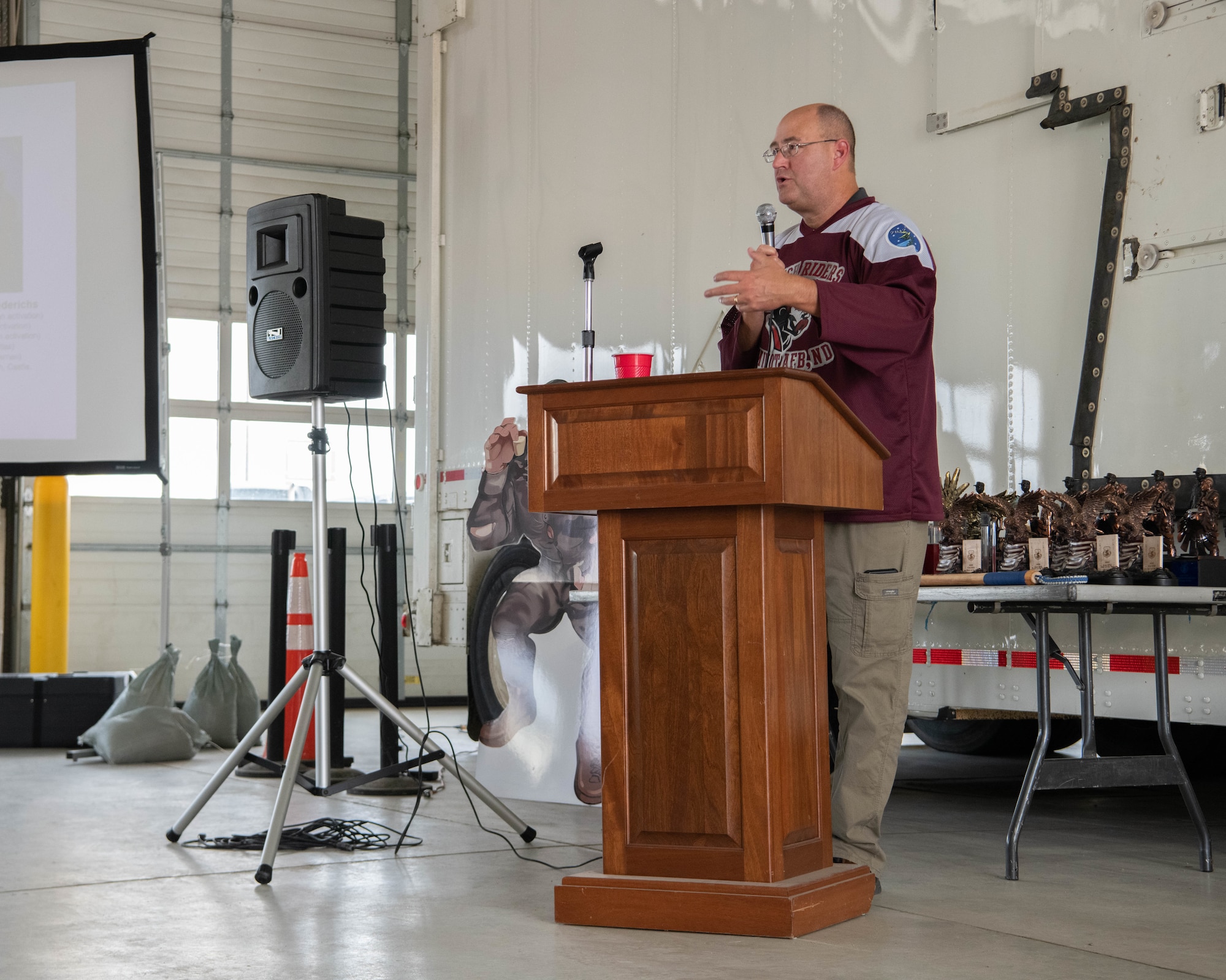 U.S. Air Force Col. Jeffrey Anderson, 5th Maintenance Group (MXG) commander, delivers a speech to the crowd at the 5th MXG’s Maintenance Professionals of the Year awards banquet at Minot Air Force Base, North Dakota, May 25, 2023. Anderson spoke on how vital the mission is at Minot, and thanked everyone for their contribution. (U.S. Air Force photo by Airman 1st Class Trust Tate)