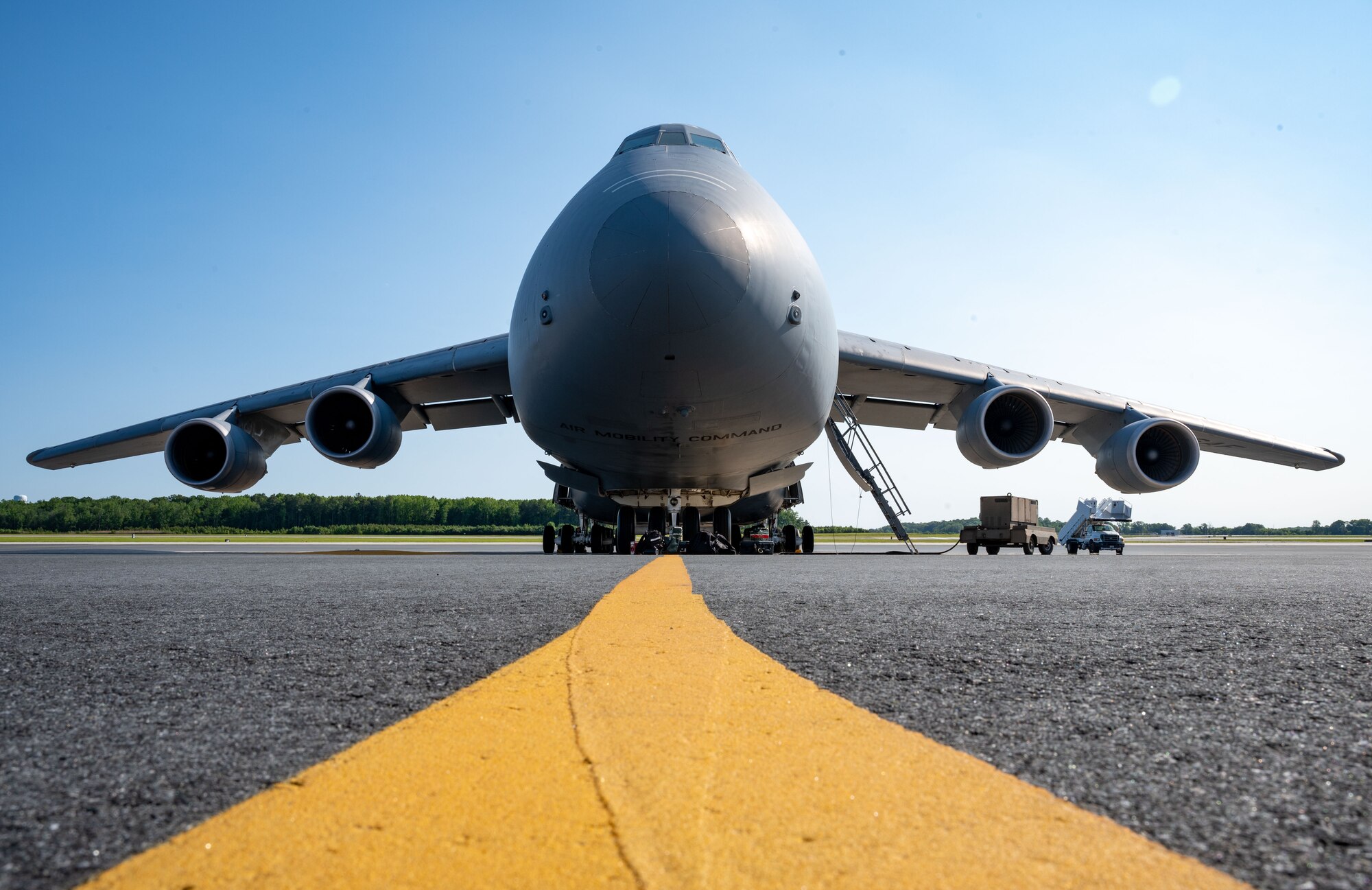 A C-5M Super Galaxy sits on the flight line at Dover Air Force Base, Delaware, May 25, 2023. Dover AFB Airmen utilize the C-5 and C-17 Globemaster III to meet global airlift capability requirements. (U.S. Air Force photo by Airman 1st Class Amanda Jett)