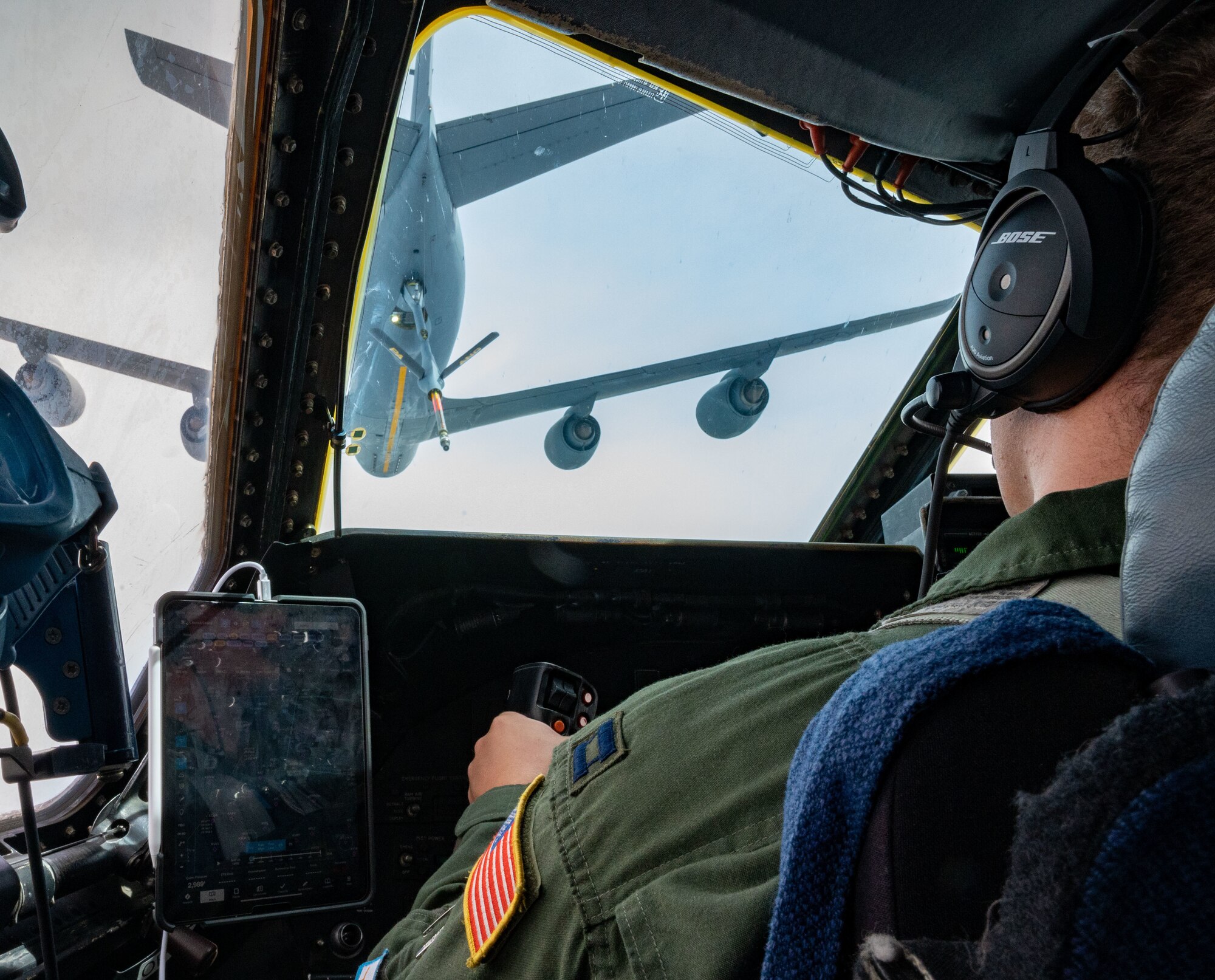 Capt. Ryan Bailey, 9th Airlift Squadron pilot, prepares to attach a C-5M Super Galaxy to a KC-10 Extender during an aerial refueling training mission over Pennsylvania, May 25, 2023. The 9th AS routinely flies aerial refueling missions to meet global airlift capability requirements. (U.S. Air Force photo by Airman 1st Class Amanda Jett)