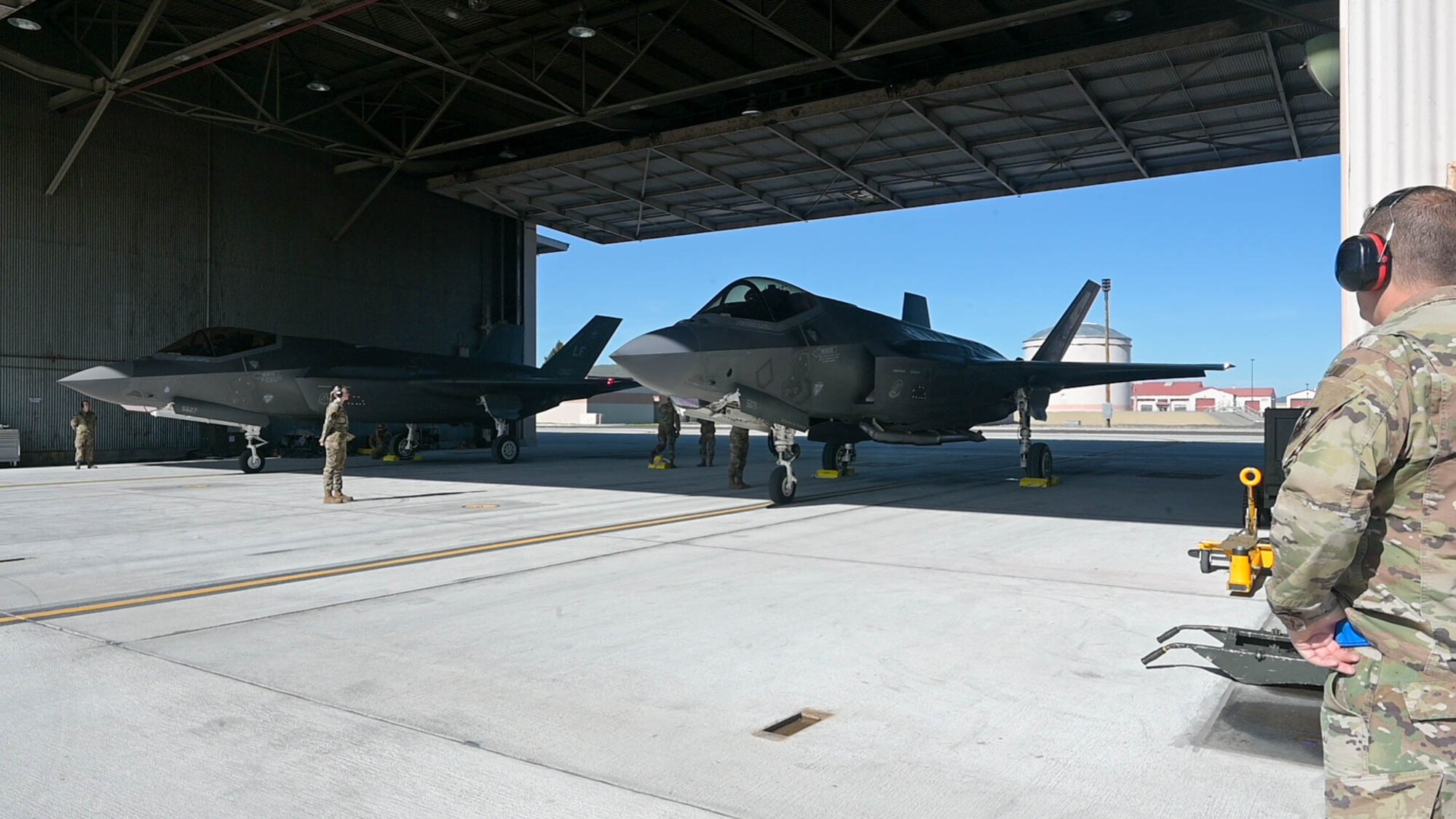 U.S. Air Force Airmen assigned to the 62nd Aircraft Maintenance Unit, Luke Air Force Base, Arizona, prepare to launch two F-35A Lightning II aircraft, May 12, 2023, at Kingsley Field Air National Guard Base, Oregon.
