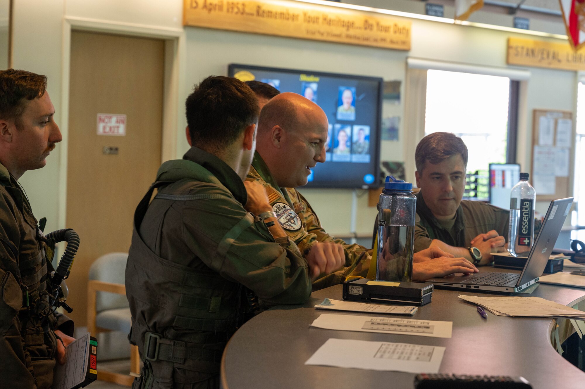 U.S. Air Force Airmen assigned to the 173rd Fighter Wing, Kingsley Field Air National Guard Base, Oregon, and the 56th Fighter Wing, Luke Air Force Base, Arizona, listen to a pre-flight weather brief May 15, 2023, at Kingsley Field ANGB, Oregon.